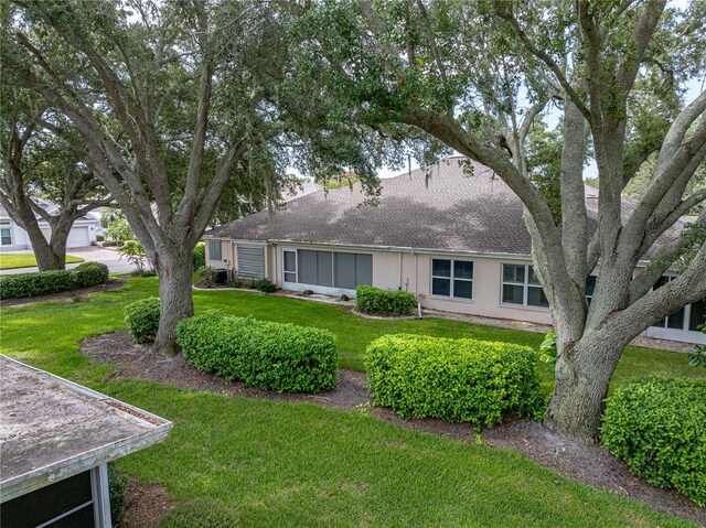 view of front of property with a front lawn