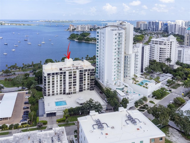 drone / aerial view with a water view