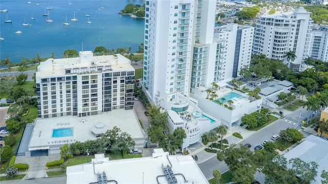 birds eye view of property with a water view