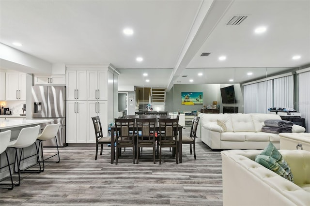 dining room featuring hardwood / wood-style flooring