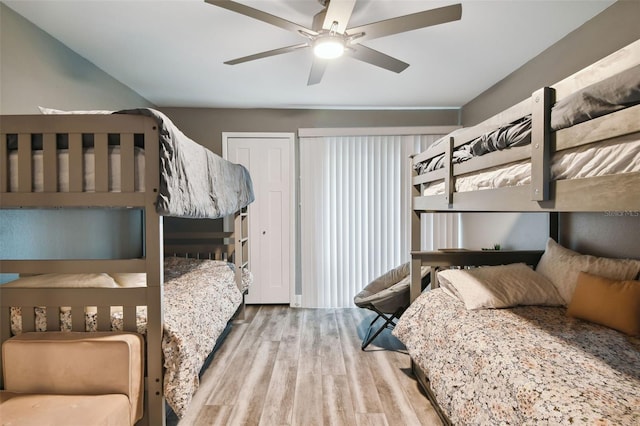 bedroom with hardwood / wood-style flooring and ceiling fan