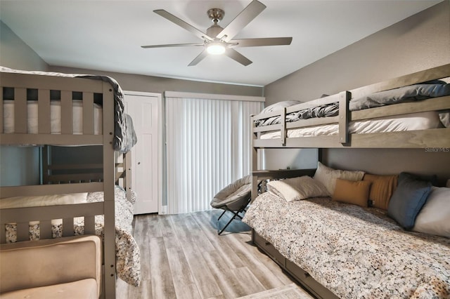 bedroom featuring hardwood / wood-style flooring and ceiling fan