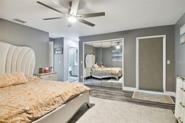 bedroom featuring hardwood / wood-style flooring and ceiling fan