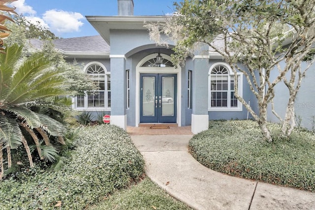 doorway to property featuring french doors