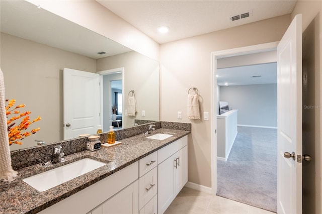 bathroom featuring vanity and tile patterned floors