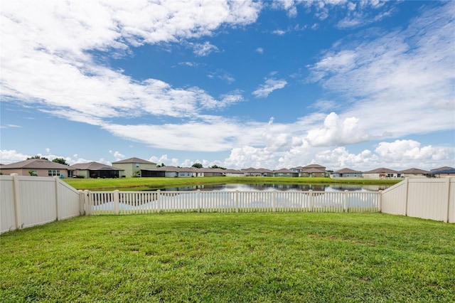 view of yard with a water view