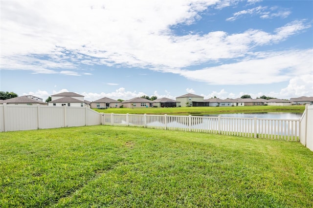 view of yard with a water view