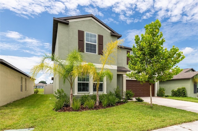 view of front of property with a garage and a front lawn