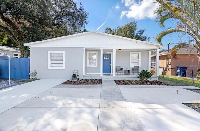 bungalow featuring covered porch