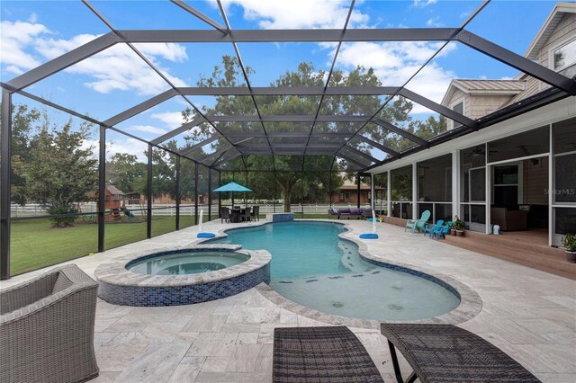 view of swimming pool with central air condition unit, an in ground hot tub, a patio, and glass enclosure