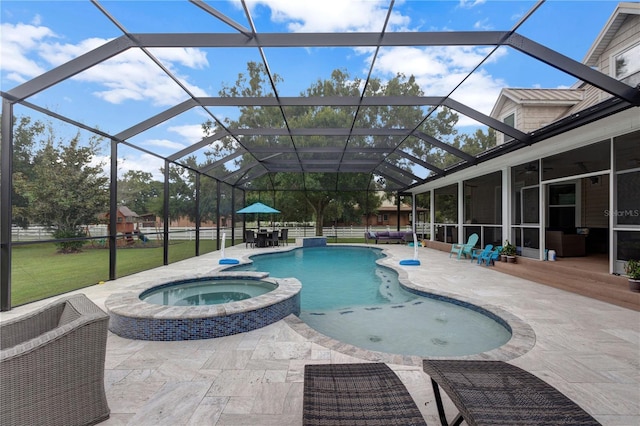 view of pool with a patio, cooling unit, an in ground hot tub, glass enclosure, and a sunroom