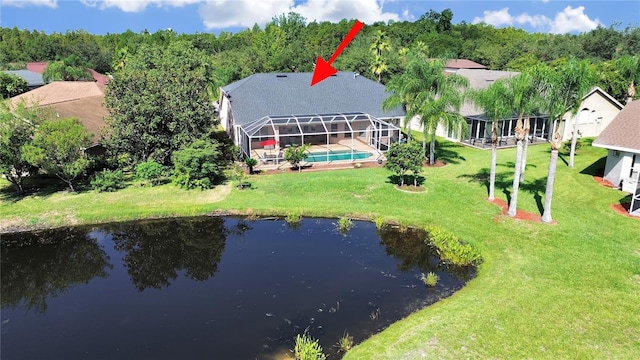 birds eye view of property featuring a water view