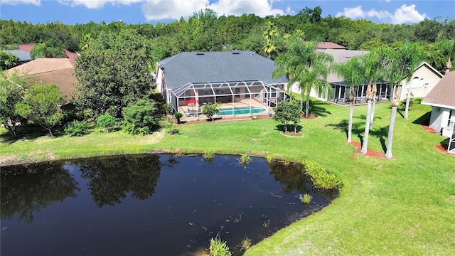 drone / aerial view with a water view