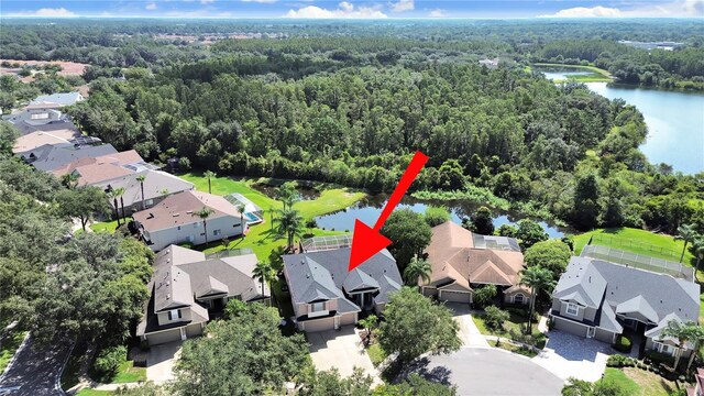 birds eye view of property featuring a water view