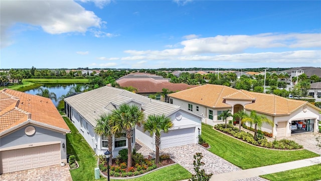 drone / aerial view with a water view