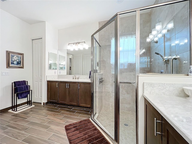 bathroom with vanity and an enclosed shower