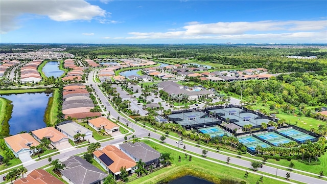 drone / aerial view with a water view