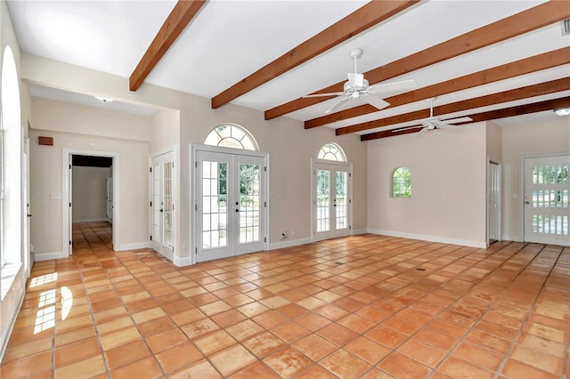 unfurnished living room featuring french doors, light tile patterned floors, and ceiling fan