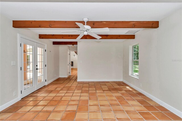 unfurnished room with beamed ceiling, ceiling fan, and light tile patterned floors