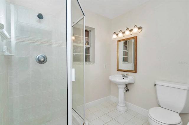 bathroom featuring toilet, tile patterned flooring, and walk in shower