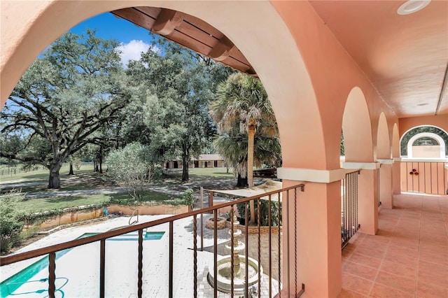 balcony featuring a pool