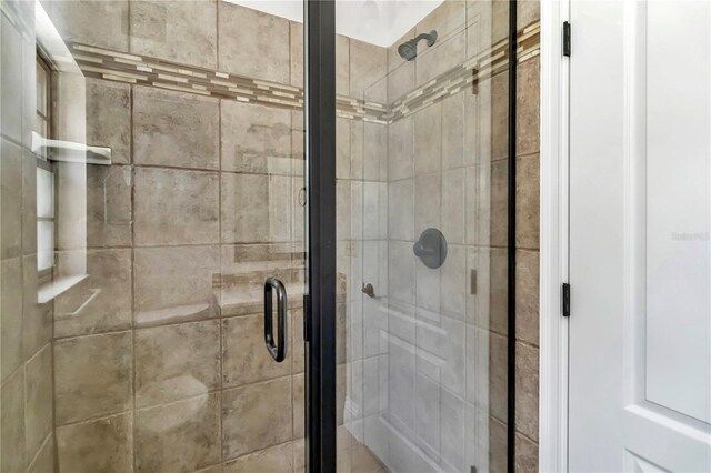 bathroom with an enclosed shower