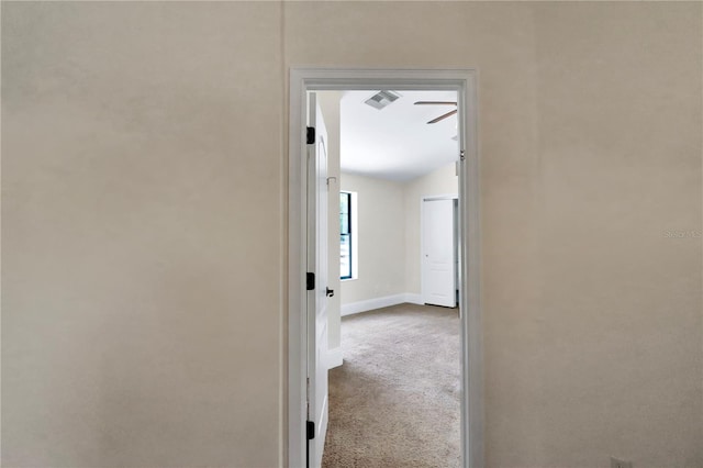 corridor featuring carpet