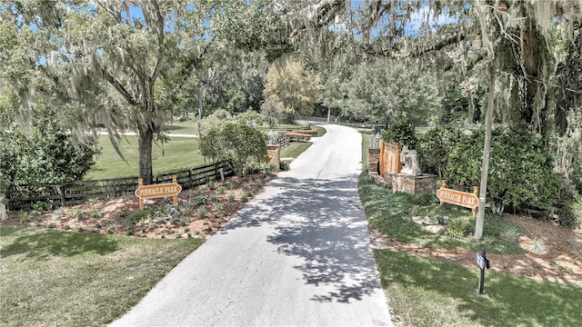 view of home's community featuring a yard