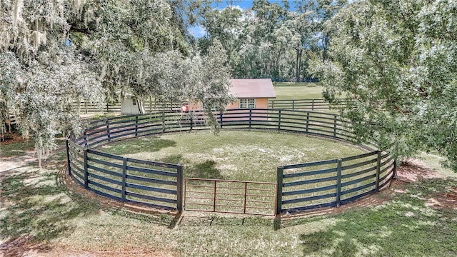 view of yard with a rural view