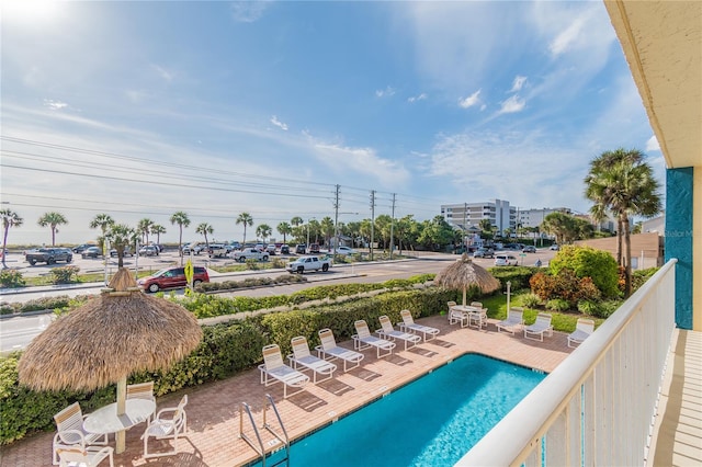 view of pool featuring a patio area