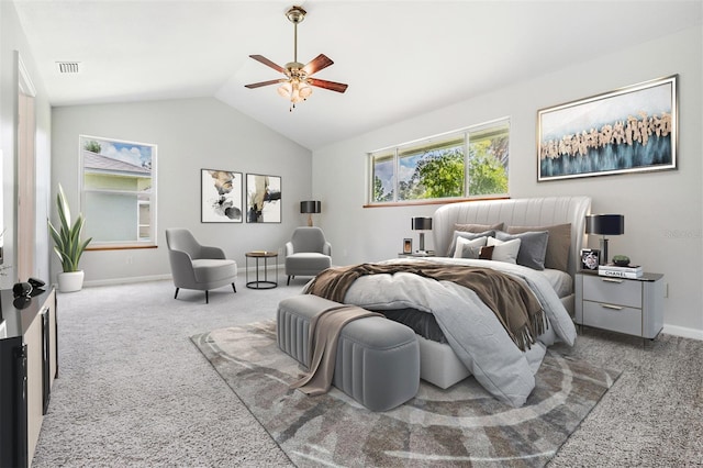 bedroom with vaulted ceiling, carpet flooring, and ceiling fan