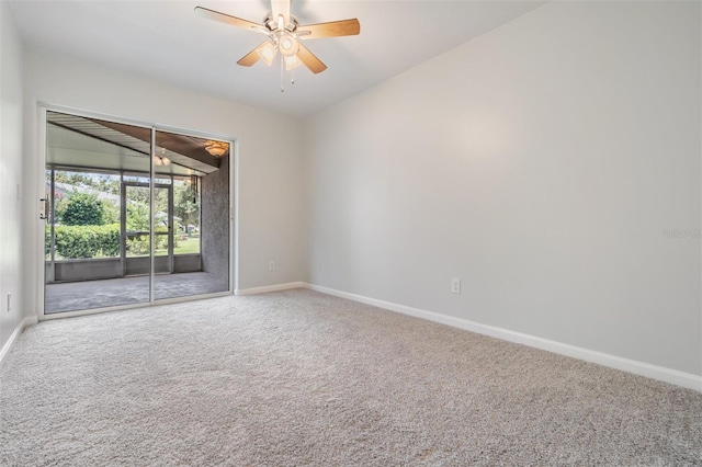 empty room featuring carpet flooring and ceiling fan