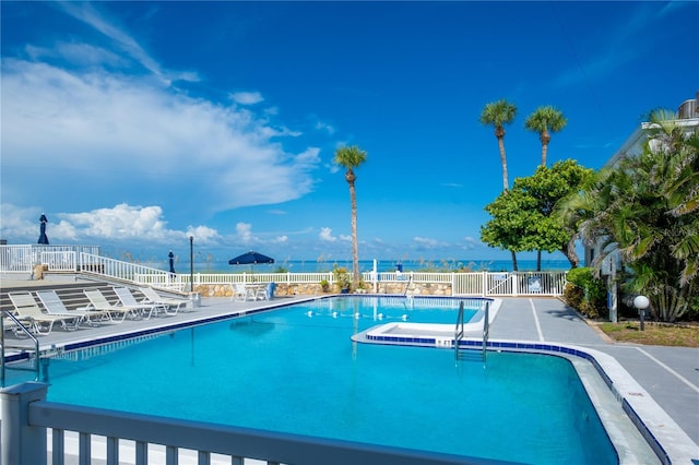 view of pool featuring a patio