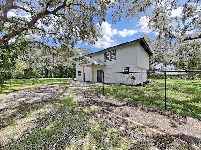 exterior space with a lawn