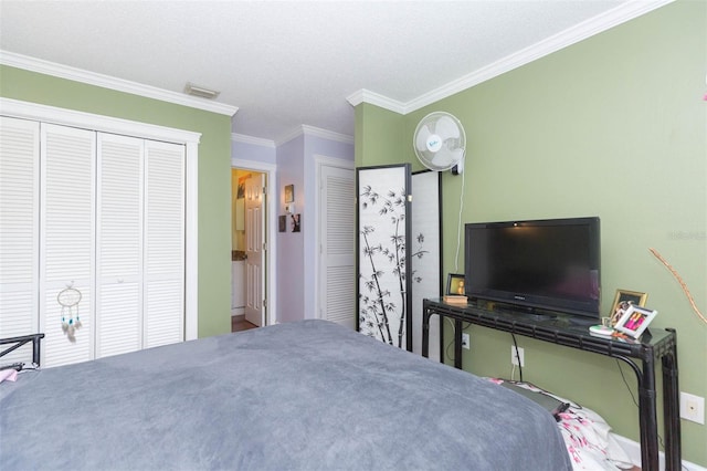 unfurnished bedroom featuring a textured ceiling, a closet, and ornamental molding