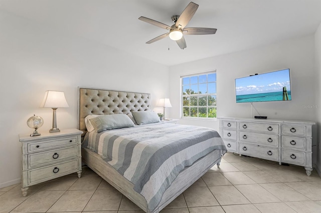 bedroom featuring ceiling fan and light tile patterned flooring