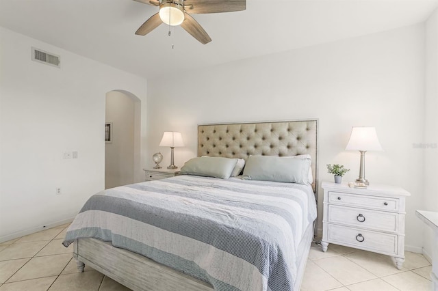 bedroom with light tile patterned flooring and ceiling fan