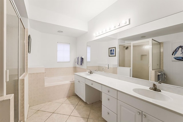 bathroom featuring vanity, tile patterned floors, and independent shower and bath