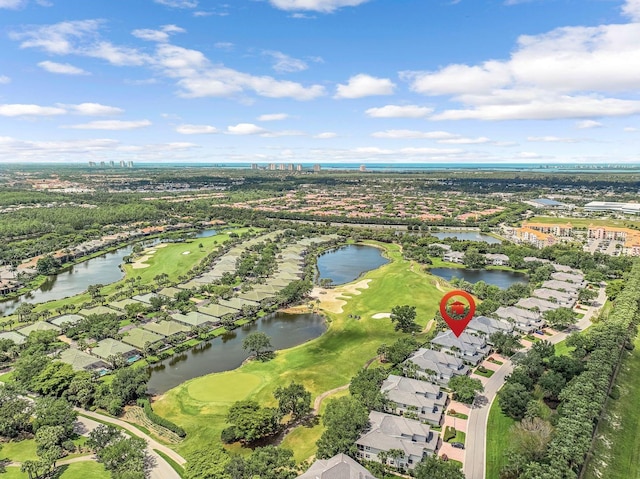 drone / aerial view with a water view