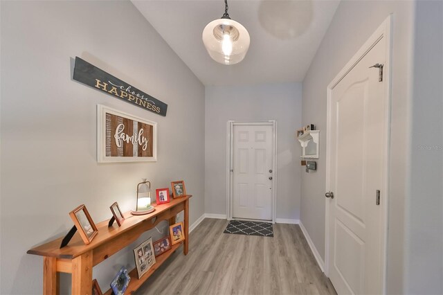 entryway with light hardwood / wood-style flooring