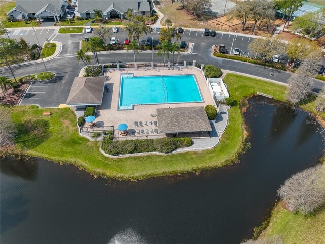 birds eye view of property featuring a water view