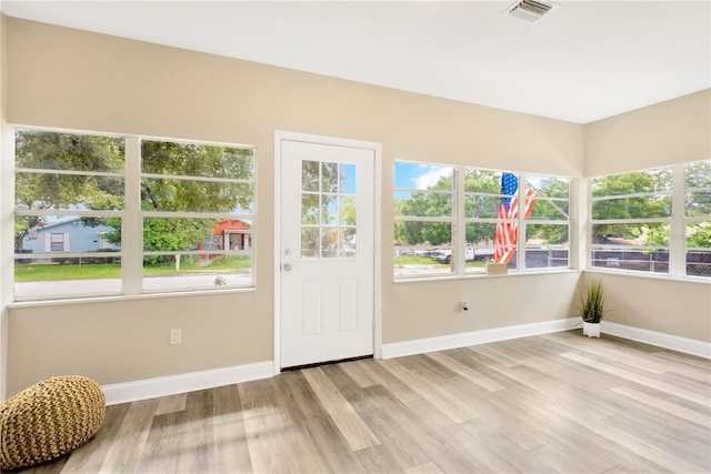 interior space with plenty of natural light and light wood-type flooring