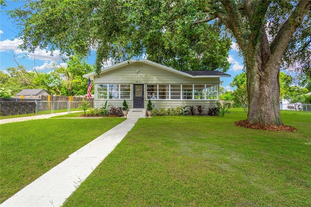 view of front of home with a front lawn