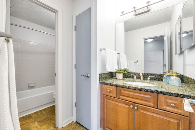 full bath with tile patterned floors, a textured ceiling, vanity, and shower / bathtub combination with curtain