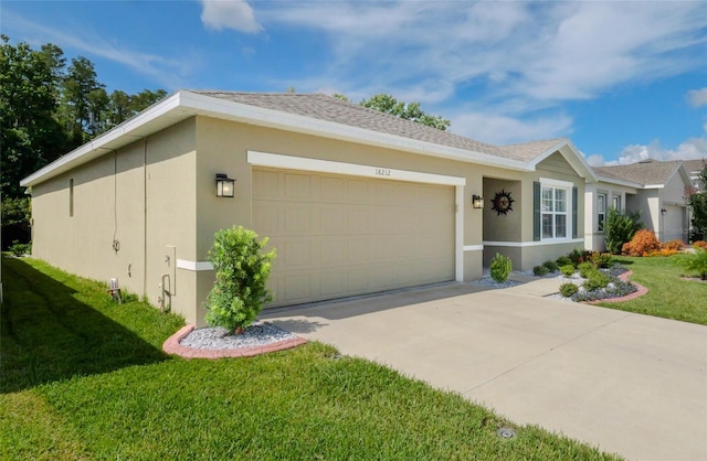 ranch-style house with a garage and a front yard