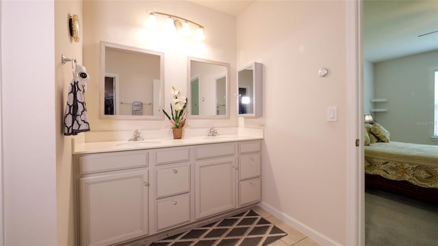 bathroom featuring dual vanity and tile patterned floors