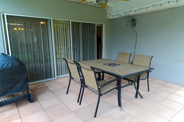 view of patio featuring ceiling fan