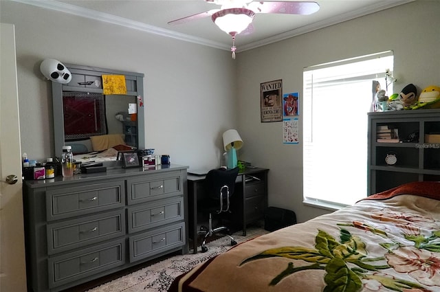 bedroom featuring ornamental molding and ceiling fan