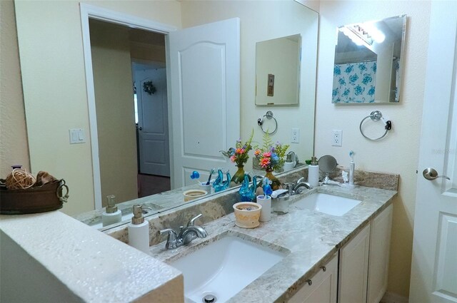 bathroom with double sink vanity