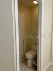 bathroom featuring toilet